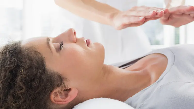 woman receives Reiki