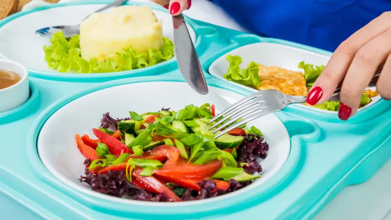 woman eating in the hospital. woman eating in the hospital.