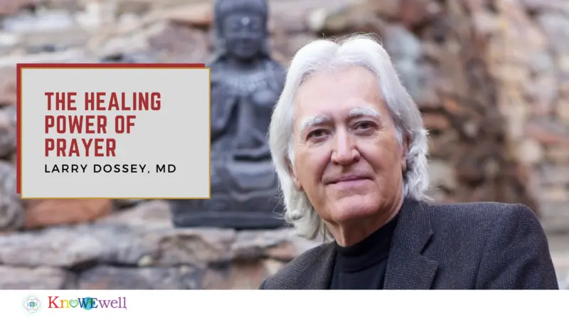 Larry Dossey, MD with prayer statue behind him