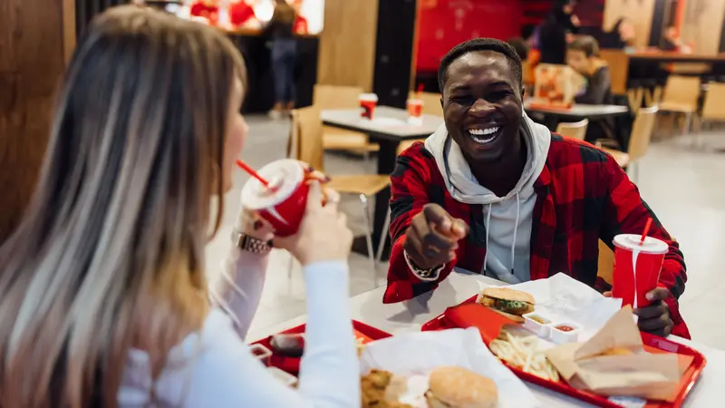 Couple enjoying fast food