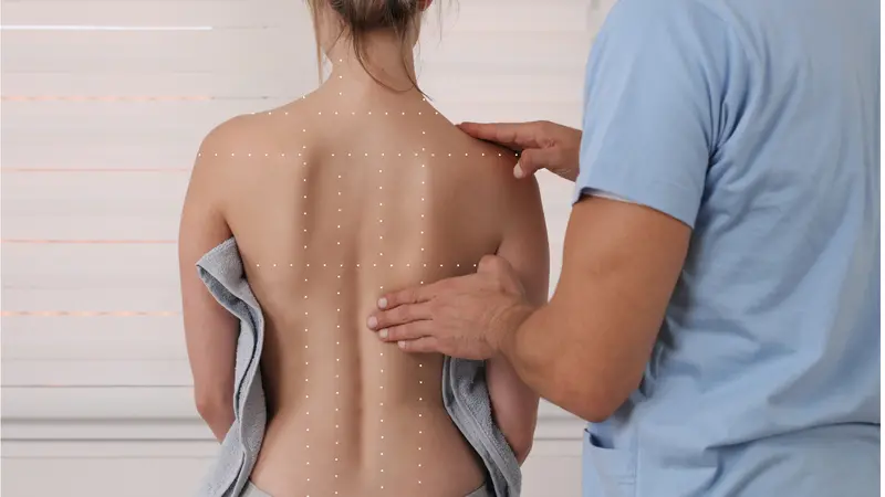 Chiropractic treatment; Back pain relief for female patient