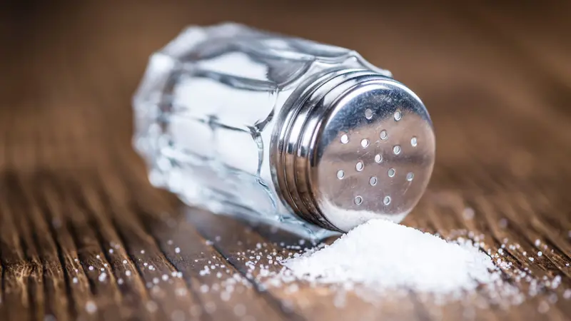 Old wooden table with a Salt Shaker