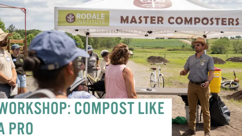 Compost tent with instructor and participants.