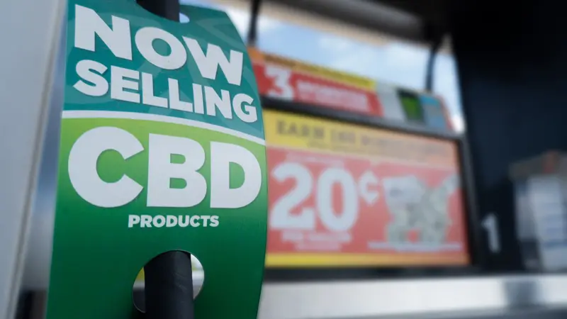 Closeup of CBD product sign at a gas station