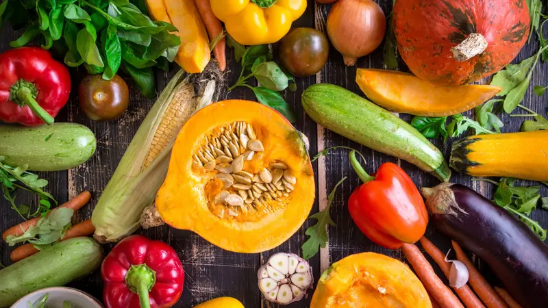 Fresh Autumn vegetables on a dark table. 