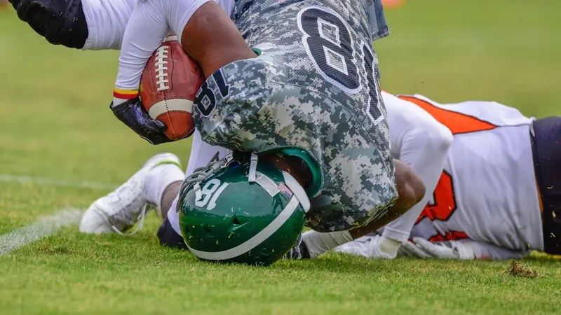 High school football player tackled on head