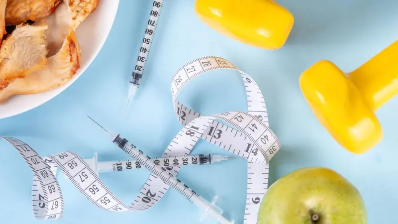 Vector for weight loss including syringes, weights and food