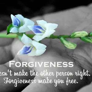 Inspirational quote - Forgiveness, does not make the other person right. Forgiveness make you free. With white flower plant in hand on black and white abstract art background.