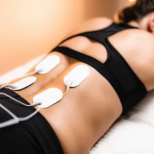 Transcutaneous Electrical Stimulation of Woman Transcutaneous Electrical Stimulation of Woman