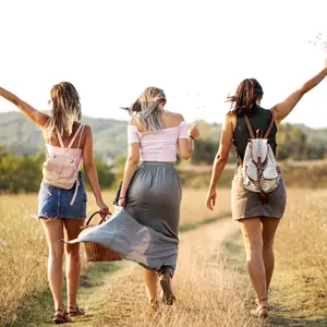Three women walking without a care Three women walking without a care