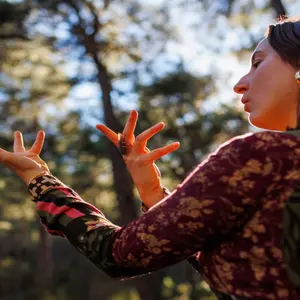 woman in forest dancing solo woman in forest dancing solo